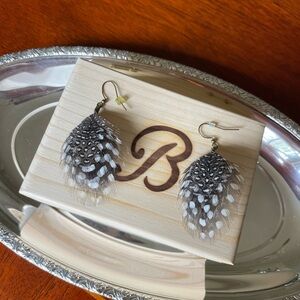 Brackish Guinea feather earrings